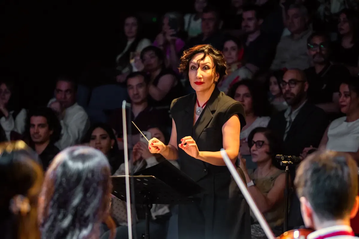 Founder Maryam Ghaemi conducting the Junior Orchestra